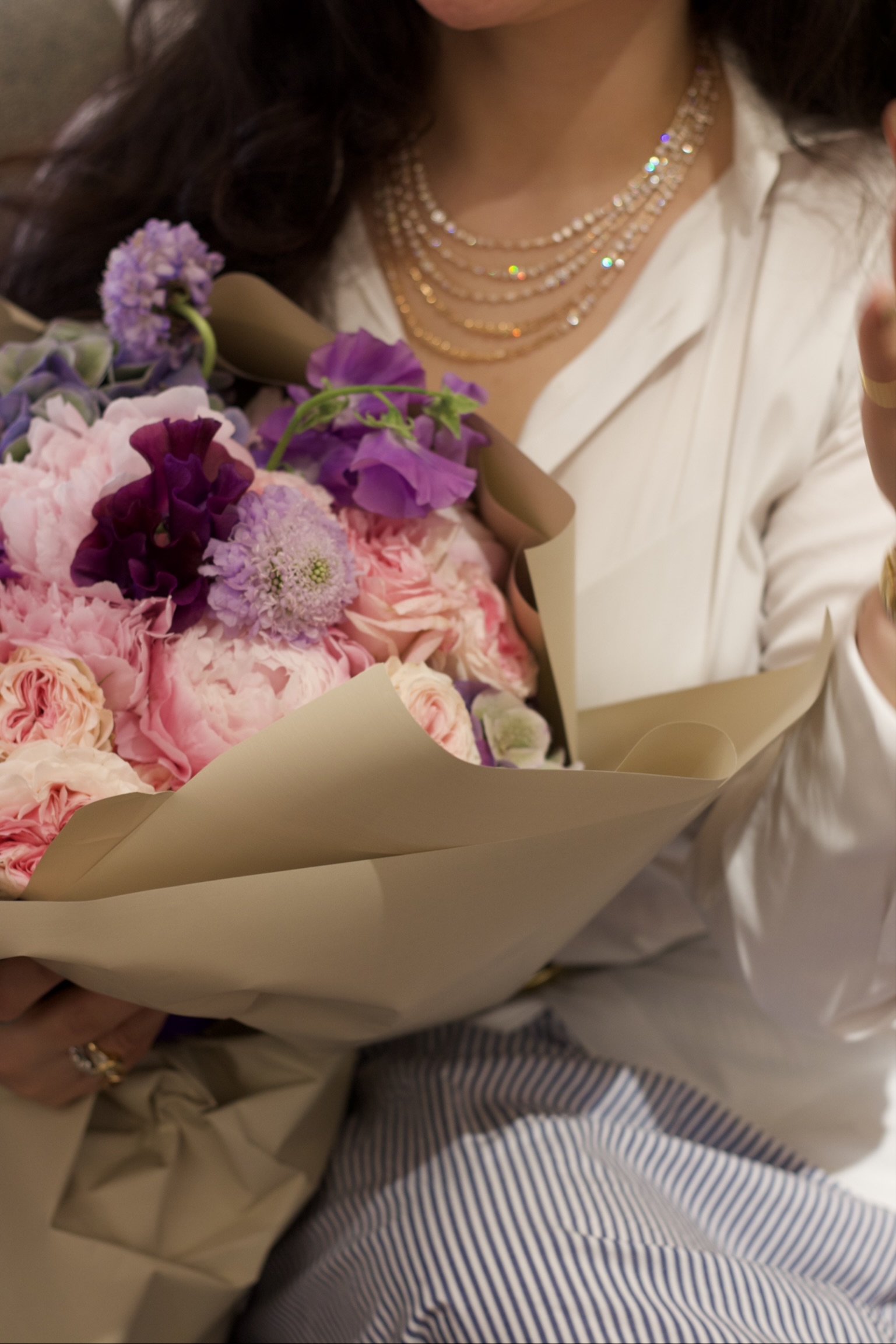 Guest receiving flowers at luxury event